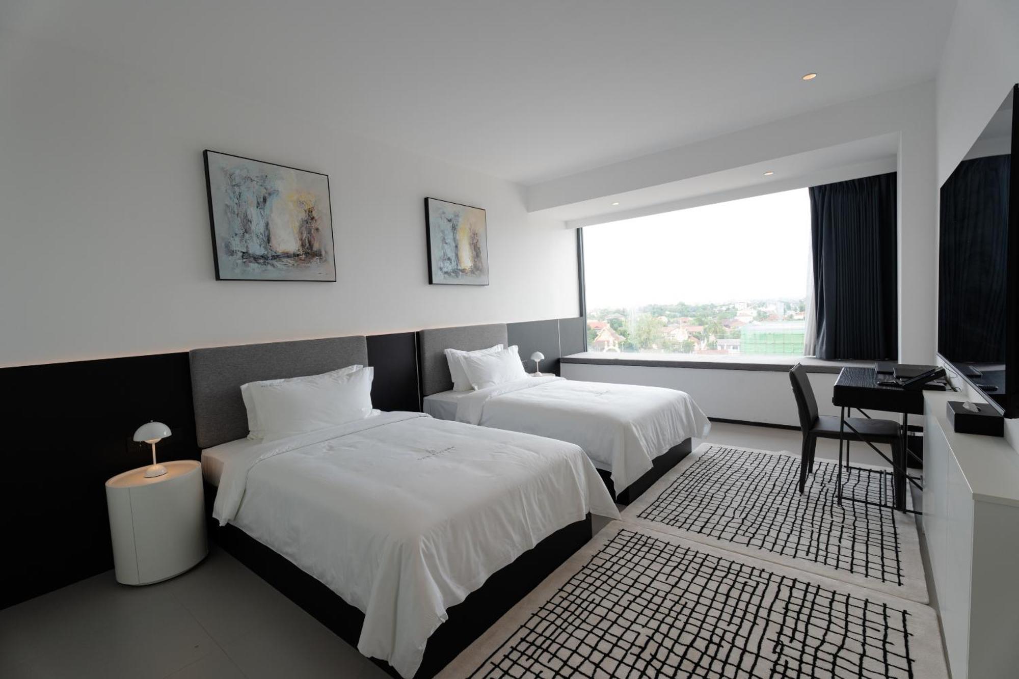 One Riviera Hotel And Residences Ban Souanmone Exterior foto